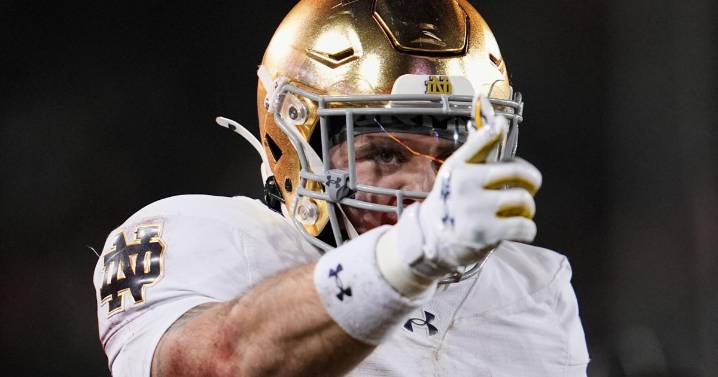 Love gets hurt but returns as No. 9 Notre Dame routs Stanford 49