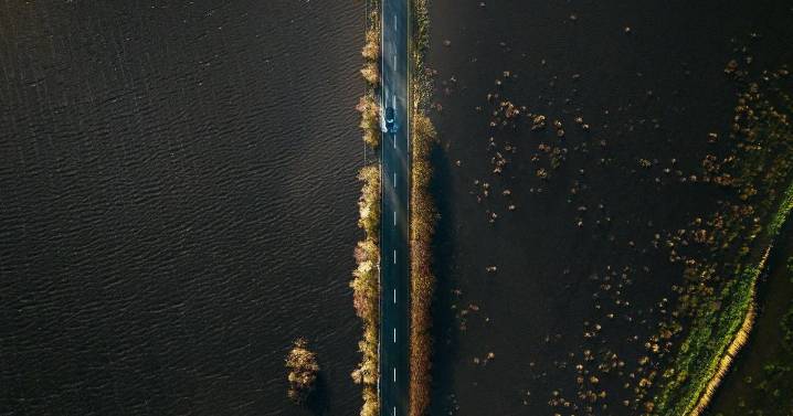 Floodwaters surround A-road causing amazing scene