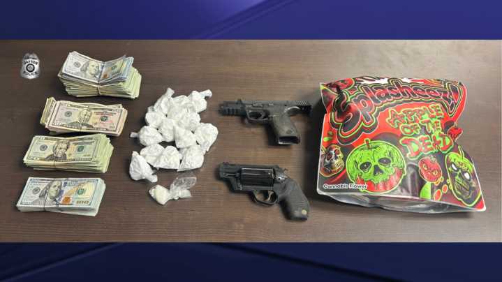 Dayton PD seizes $25K, guns and suspected drugs in warrant raid for alleged dealer