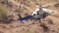 Mujer que giró a gran velocidad durante un rescate en helicóptero gana demanda (VIDEO)