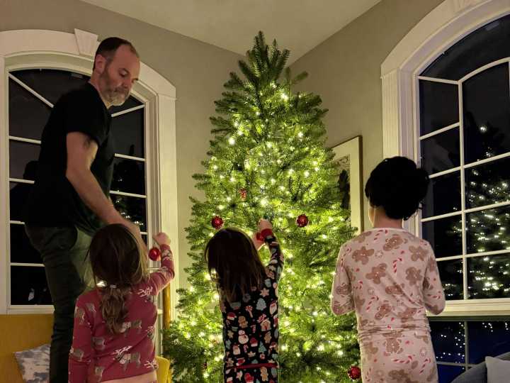 My husband handles 100% of the holiday magic, and I buy the gifts. He has the much harder job.