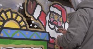 Local window painter brings holiday magic to 50+ Twin Falls businesses with festive art