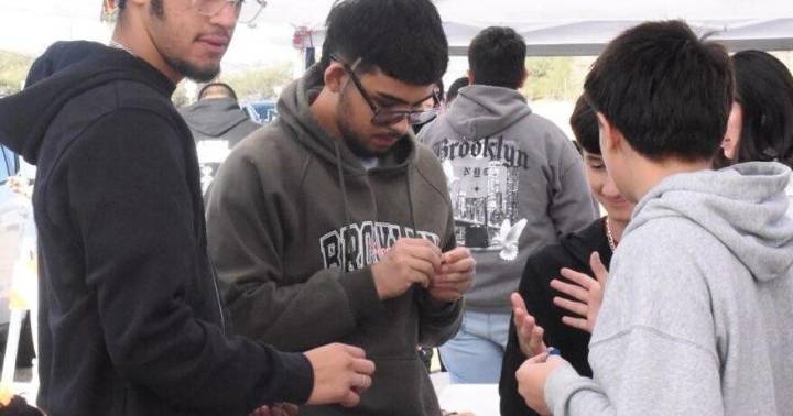 Wrestlers help with rabies clinic