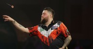 Michael Smith shows true colours in dedicating win after admitting 'heartbreak'