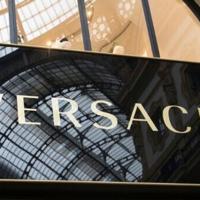 Prada completes acquisition of flashy rival Versace