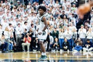 Michigan State basketball newcomer donates food to Lansing needy