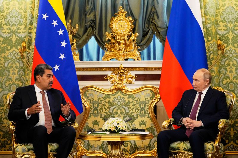 Putin calls Maduro, Lukashenko meets Venezuela envoy as Trump cranks up pressure