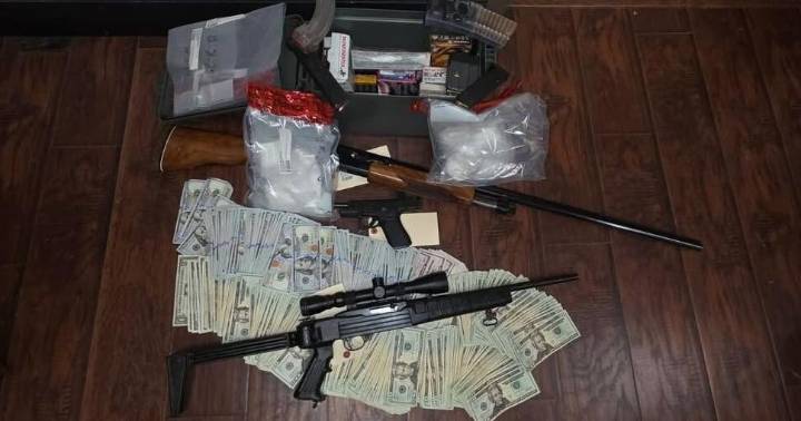 Tennessee man shoots at deputies during pursuit; later arrested with guns, drugs, and cash