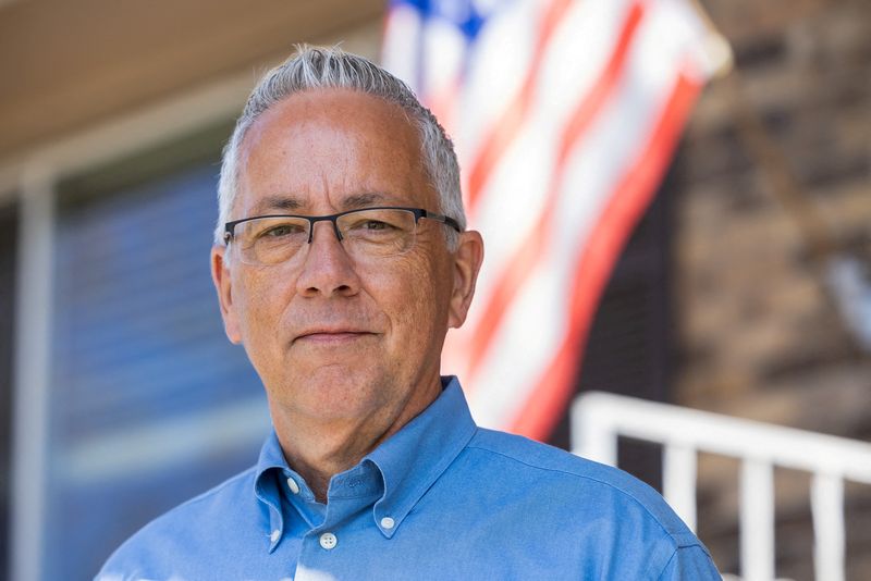 Pinched by higher prices, many Trump voters say: Don't blame the president