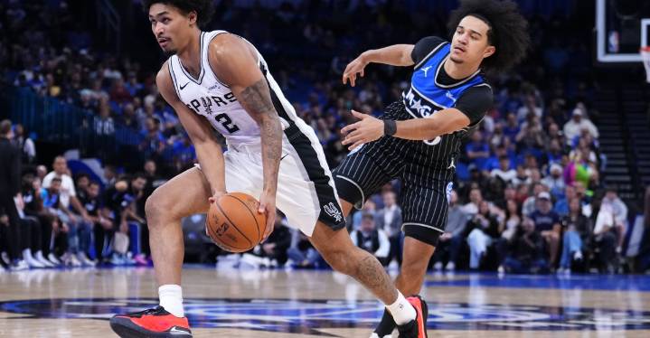 Tired Spurs use team effort and clutch play to vanquish the Magic