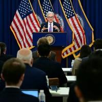 Divided US Fed makes third straight rate cut, signals higher bar ahead