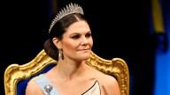 Crown Princess Victoria and Princess Madeleine dazzle in tiaras as Princess Sofia misses glittering ceremony