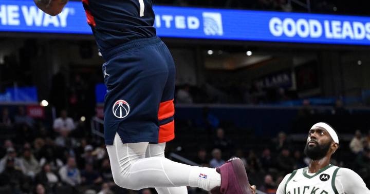 McCollum and Middleton lead the Wizards to a 129-126 win over Milwaukee despite Porter's 30 points