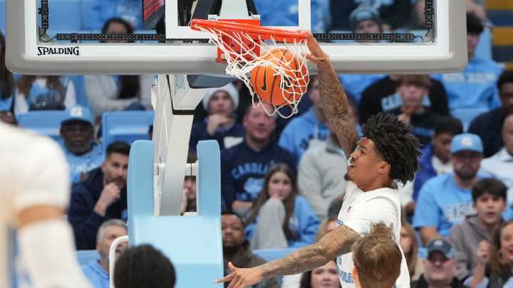 Jonathan Powell brings passion, Hubert Davis brings fire in UNC win