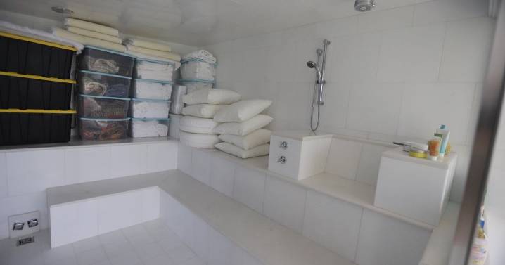 Jeffrey Epstein's home 'never-before-seen' photos - creepy masks and large number of towels