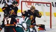 Wolf’s rebound effort backstops Flames to confidence