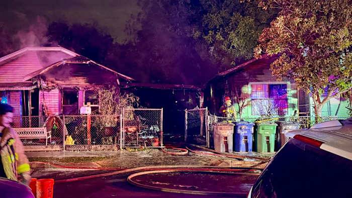 Two West Side homes damaged in fire that began under carport