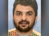 Suspect in National Guard shootings pleads not guilty to murder