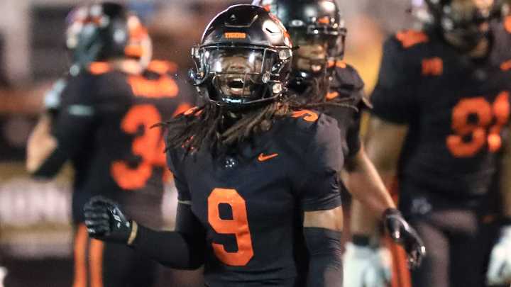 Where area high school football players are signing today