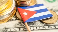 Cuba oficializa con un paquete legal la dolarización parcial de su economía