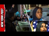 Somali Protestors Hold up Posters of Rep. Ilhan Omar During Mogadishu Demonstration Against Trump