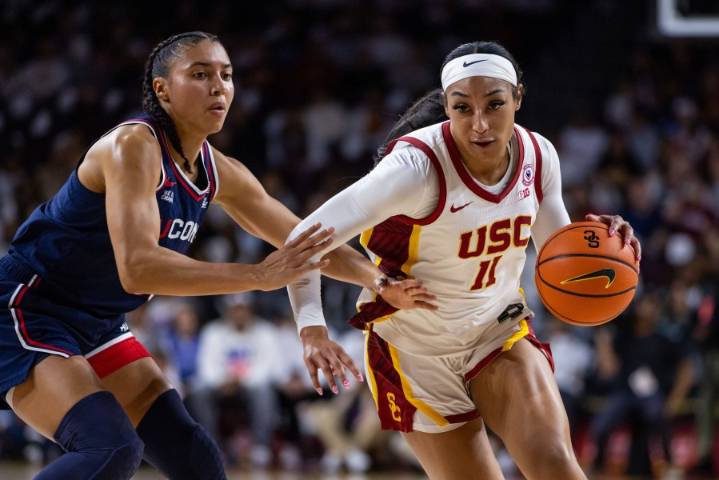 Azzi Fudd leads No. 1 UConn's 79-51 rout of 16th-ranked USC with JuJu Watkins looking on