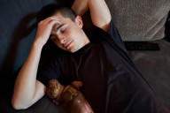 Timothée Chalamet Cuddles with a Puppy in Candid Photos From His Home Life