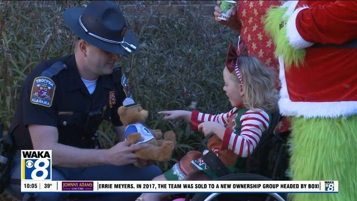 Alabama State Troopers bring Christmas cheer to hospitalized children