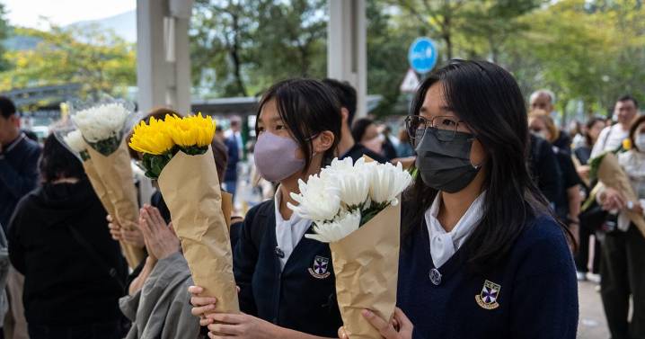Hong Kong fire probe reveals unsafe netting as public mourns and government stifles dissent