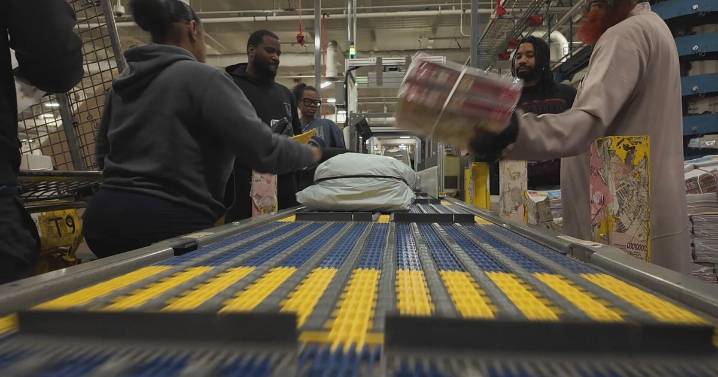 Philadelphia "Santa Clauses" at USPS push through one of Post Office's busiest weeks