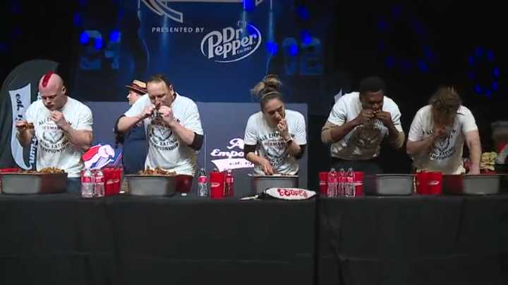 Competitive eater Joey Chestnut wins Ale Emporium's wing-eating contest at Big Ten Fan Fest in Indianapolis