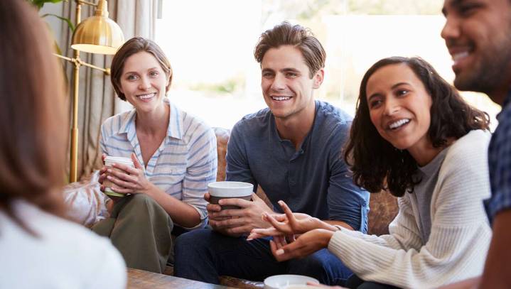 Small Group Waits In Hushed Anticipation As Newlyweds Prepare To Offer Marriage Advice