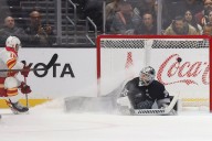 Kings scorched by Flames in overtime