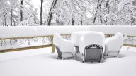 The Simple Snow Shoveling Method That'll Protect Your Deck From Damage