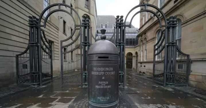 Newspaper editor arrested and charged over 'indecent online communications' after house raid