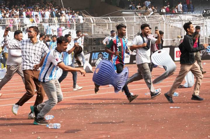 Angry fans throw bottles on field out of frustration at Messi's Kolkata event after he leaves in 10 mins