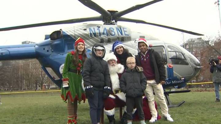 Santa arrives at Boston Common via MedFlight helicopter