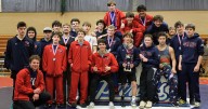 North Pole boys defend home mats at John Tobin Invitational