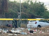 Ejecutan a taxista de aplicación y balean a joven por resistirse a secuestro