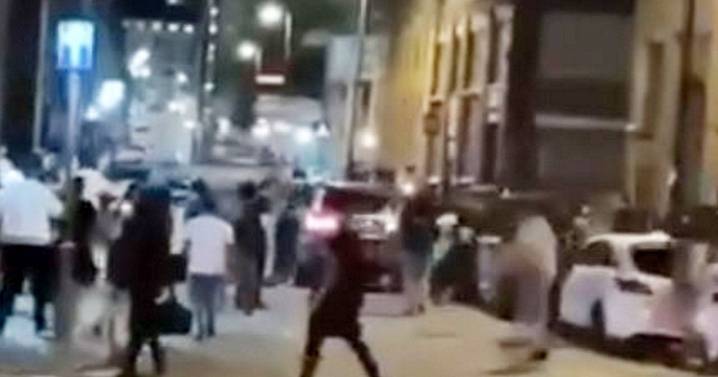 Moment thug driver ploughs car into crowd outside Birmingham nightclub