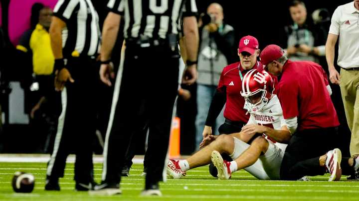 Fernando Mendoza reaction to Caden Curry's hit during Big Ten championship
