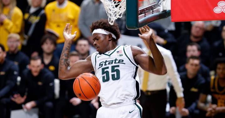 No. 7 Michigan St beats Iowa 71-52 to open defense of Big Ten title