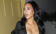 Kim Kardashian’s Lingerie Peeks Out in Cleavage-Baring Outfit at Holiday Party | Kim Kardashian 
