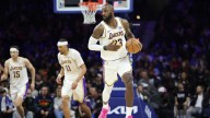 Lakers star LeBron James’ courtside interaction with fan heckling him about balding caught on video