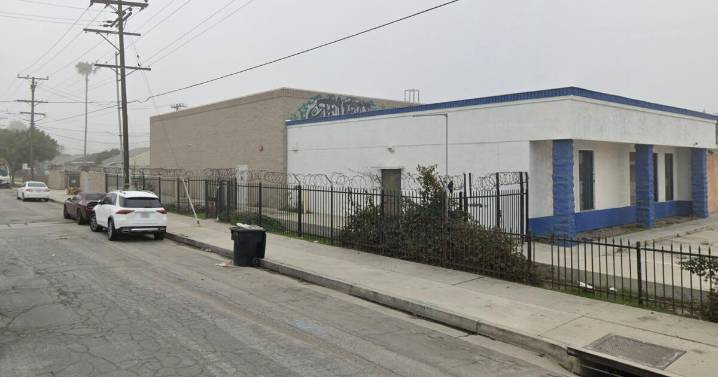 Man holding toddler is shot dead by sheriff's deputies after standoff in Paramount