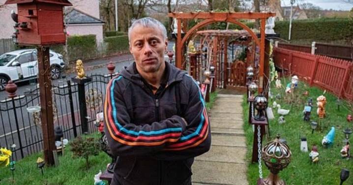 Couple win furious neighbour war to keep 'over the top' display with 30 garden gnomes 