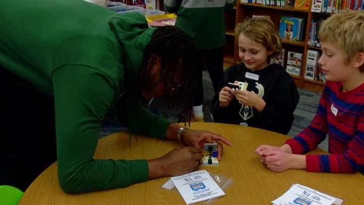 Bucks center Myles Turner builds Lego set with Milwaukee students