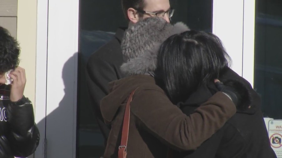 Local Afghan family ordered to report to an ICE facility draws large crowd of supporters