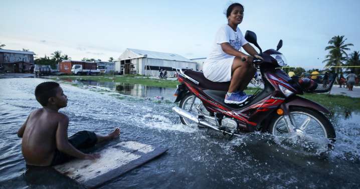 First climate migrants arrive in Australia from sinking Tuvalu in South Pacific