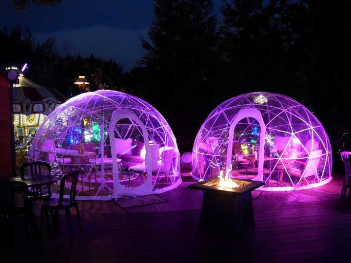 ZooLights has private, heated Snow Globes that let you enjoy the lights with hot cocoa and s’mores
